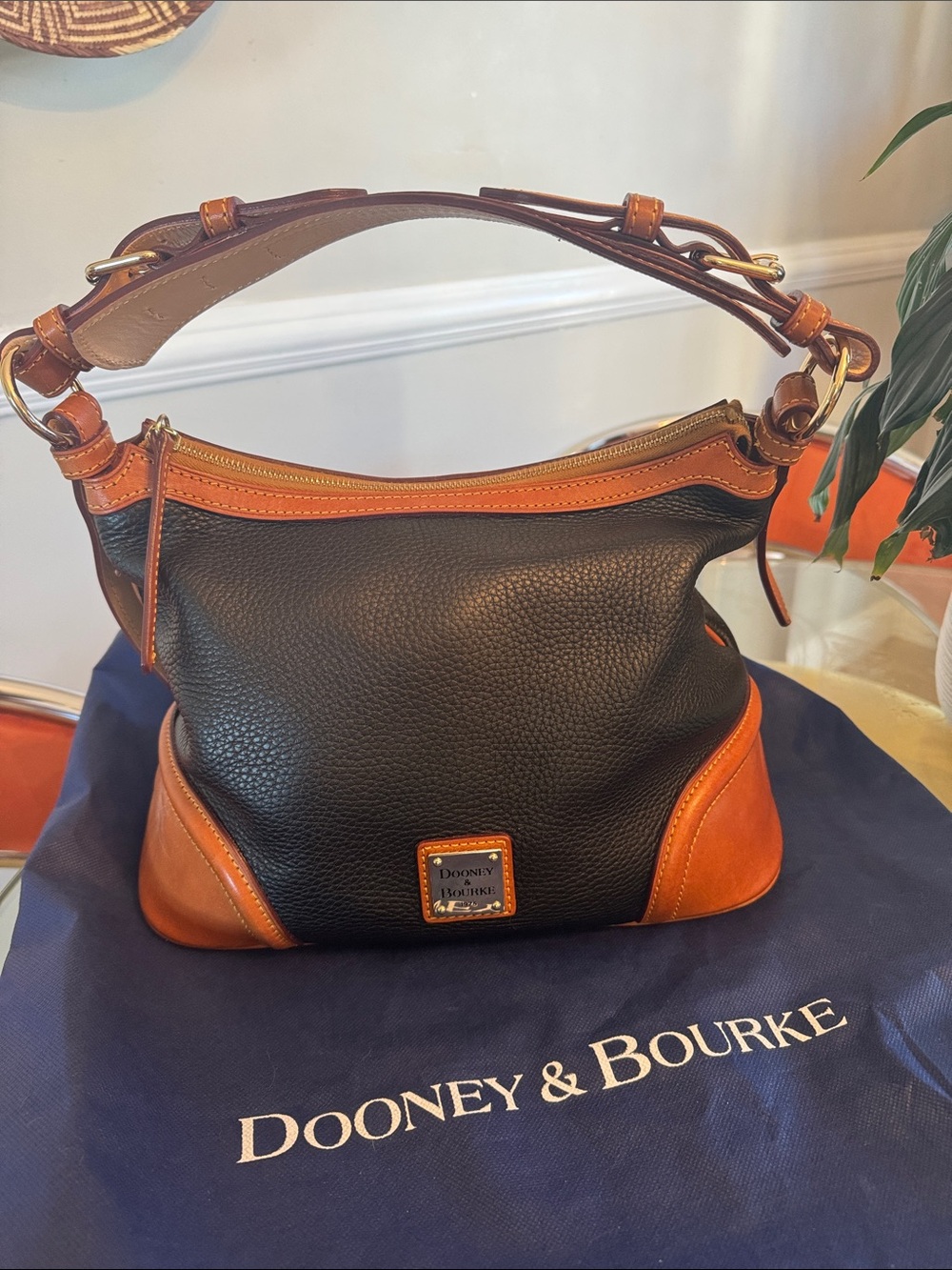 Dooney & Bourke Black Pebbled Leather Shoulder Bag with Tan Trim